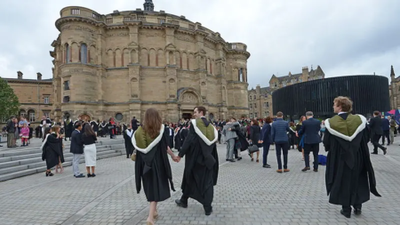 How UK’s crackdown on student visas is impacting University finances This picture was taken at the University of Edinburgh during convocation and is available on the British Council website.