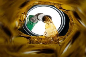 Nigeria faces fuel price increase despite oil wealth – Reports Nigerians queue at a fuel station amid rising prices and proposed 5% fuel tax.