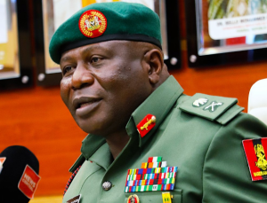 Lieutenant General Olufemi Oluyede addressing the press via a virtual media chat, assuring Nigerians of military efforts to end violence in Benue and Plateau and calling for community cooperation.