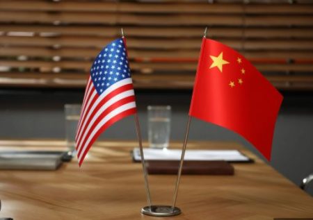 China reaffirms trade agreement with U.S China and US flags