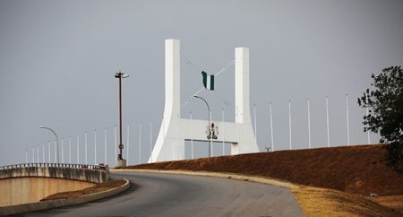 Nigerians react as US warns citizens to avoid military, govt facilities in Abuja Abuja city gate