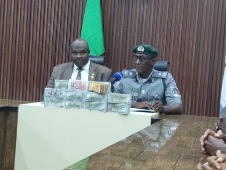 EFCC and NCS with the suspect