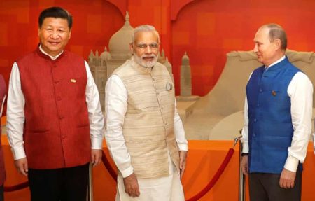 Modi visits China as US tariffs strain India ties