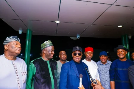 Akpabio with members of the senate upon his arrival to Nigeria