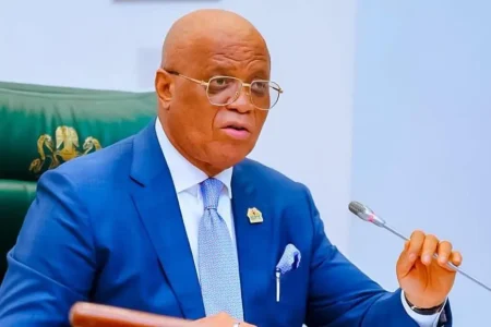 Defection: Governor Eno reaffirms loyalty to APC Governor Umo Eno speaks at an APC rally in Eket, Akwa Ibom State.