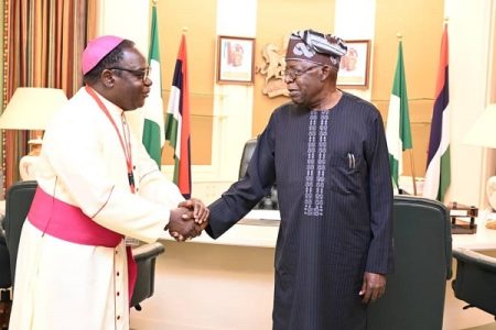 Tinubu greets Bishop Kukah at 73 Bola and Matthew Kukah
