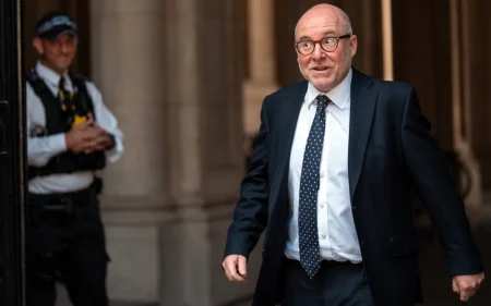 Attorney general under fire for providing legal support to migrants Attorney general under fire for past legal support to migrant charity opposing deportations