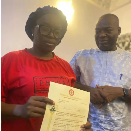 Nwoye appoints Justina Azuka as aide after by-election loss Senator Tony Nwoye hands appointment letter to Justina Azuka after her by-election loss