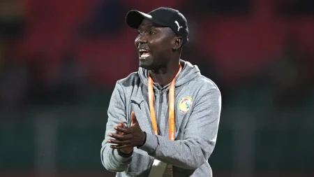 Senegal coach Diallo credits teamwork and tactics for 1-0 CHAN 2024 win over Nigeria, praising midfield control and wing play after Gomis' late goal.