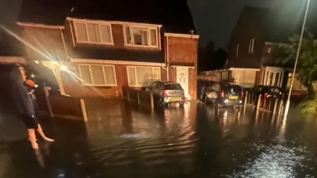 Streets flooded as heavy rain batters North-West England Flooding