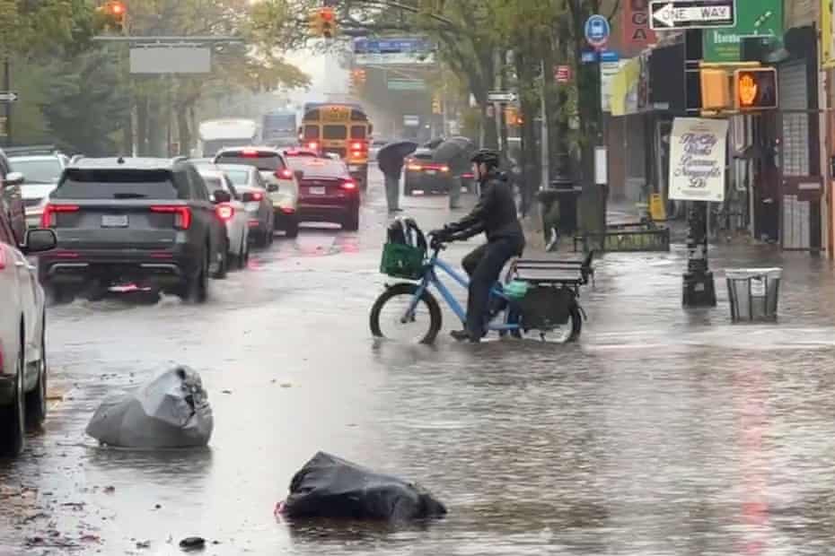 Two dead as torrential rain floods New York City