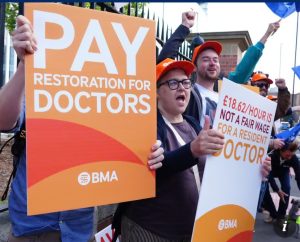 Resident doctors in England to embark on 5-day strike over jobs, pay dispute UK resident doctors protest