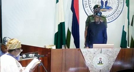 Tinubu swears in Amupitan as INEC chairman  Joash Amupitan being sworn in by President Tinubu on Thursday