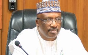 Lt. Gen. Abdulrahman Dambazau speaks at an event in Abuja, warning that the US may be seeking to establish a military base in Nigeria amid claims of religious persecution.