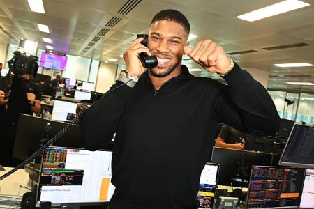 Joshua takes huge payday to fight novice Jake Paul in Miami, a mismatch critics call dangerous but guaranteed to draw massive global attention.