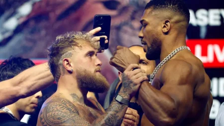 Anthony Joshua told Jake Paul “don’t touch me” after a tense weigh-in face-off in Miami, as the two traded barbs ahead of their controversial heavyweight bout.