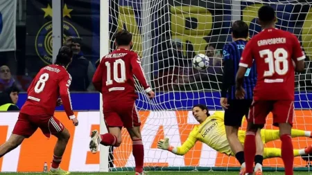 Szoboszlai’s late penalty gives Liverpool a vital 1-0 win at Inter, ending their 19-game home run and lifting the Reds into the Champions League top eight.
