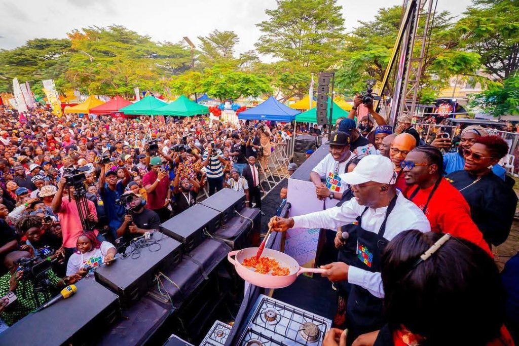 Governor Babajide Sanwo-Olu cooking at the festival