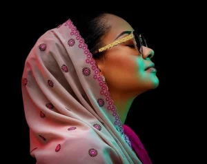 Court dismisses defamation suit against Natasha Senator Natasha Akpoti-Uduaghan at a school inauguration, smiling and interacting with students during legacy project activities.