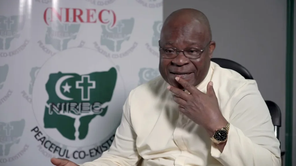 Professor Cornelius Omonokhua speaking at a religious freedom event in Abuja.