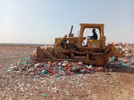 NAFDAC officials overseeing the destruction of counterfeit and expired medicines and products at the Kalibawa site in Kano.