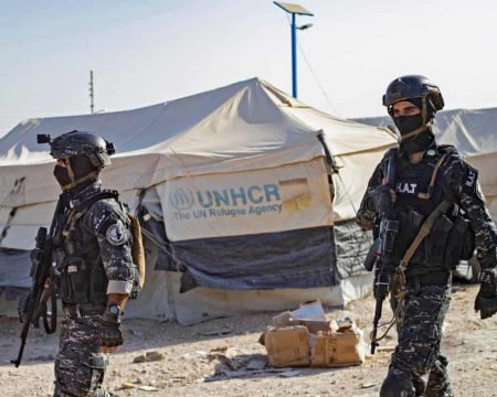 Kurdish forces walk away from IS camp