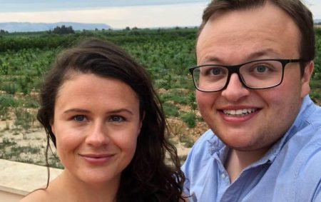 David Taylor, pictured with his partner Joani Reid, is the head of programmes at a think tank that develops engagement between Asia and Europe