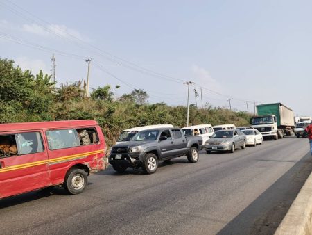 Overturned Mack truck and containers on Otedola Bridge causing traffic on Lagos-Ibadan Expressway before LASTMA cleared the road.