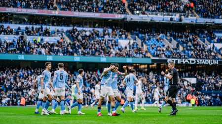 Manchester City celebrating their victory against Liverpool in the Quarter finals of the FA Cup