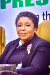 Didi Walson-Jack addressing journalists in Abuja on new Federal Government reforms increasing allowances and benefits for civil servants.