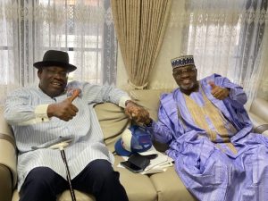 Seriake Dickson receives Kabir Marafa and supporters into the Nigeria Democratic Congress during a political meeting.