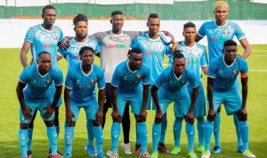 Remo Stars relegated to NNL after disappointing NPFL season Remo Stars players and officials reflecting on a match outcome during their NPFL season at a football stadium in Nigeria.