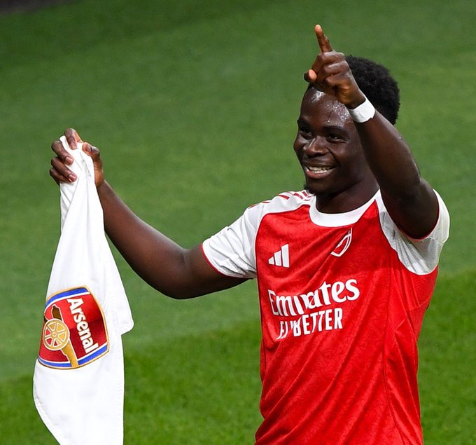 Saka fires warning to critics as Arsenal celebrate Premier League title triumph Bukayo Saka celebrating with Arsenal teammates after winning the Premier League title at London Colney training ground.